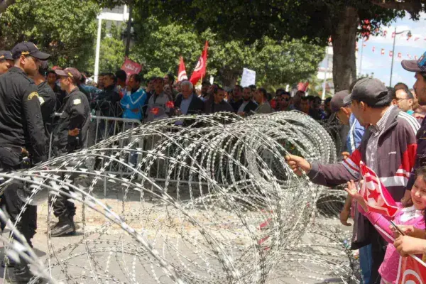 Tunisians Rally Amid Economic Crisis and Political Arrests