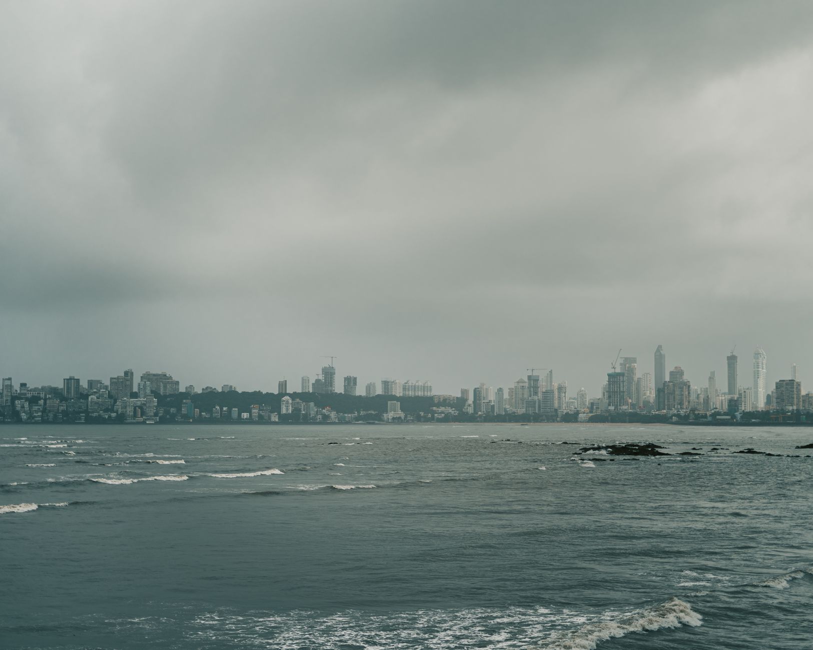 Fitch Retains India's BBB- Rating Amid Strong Growth and Fiscal Deficit Concerns