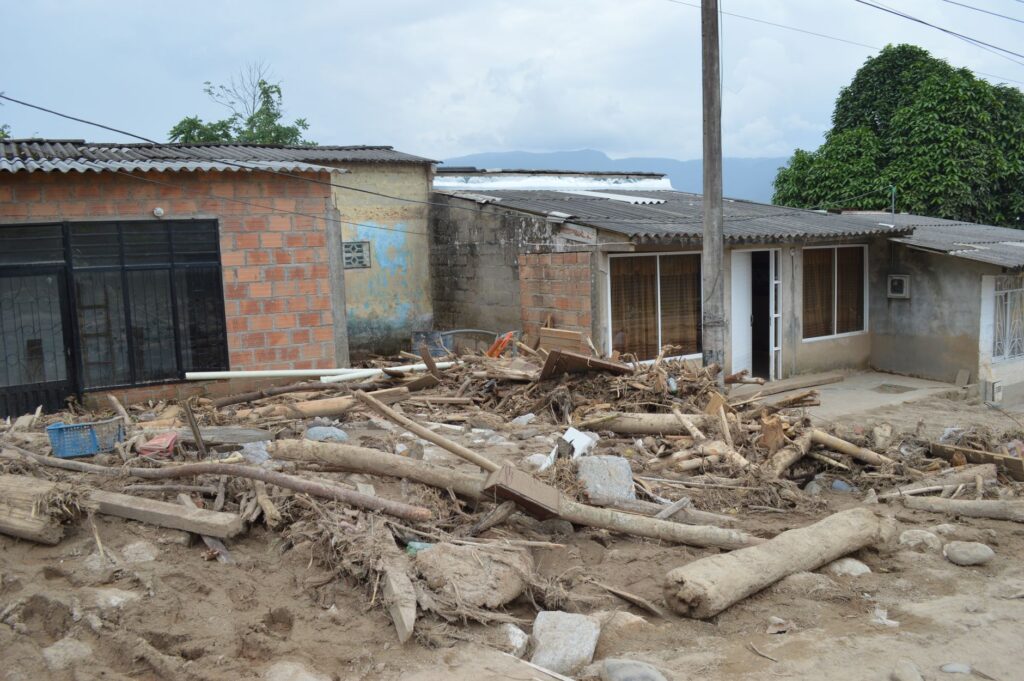 Rural village houses damaged by flood debris in Mocoa, Colombia.