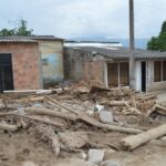Rural village houses damaged by flood debris in Mocoa, Colombia.