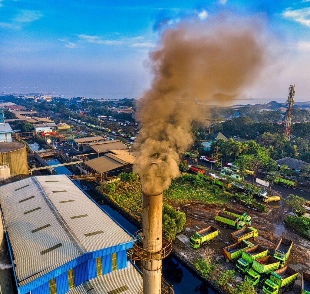 Aerial photograph showcasing air pollution from a factory in Jakarta, Indonesia.