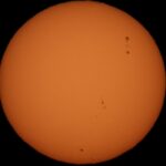 Detailed photo of the Sun showing sunspots, ideal for science or astronomy content.