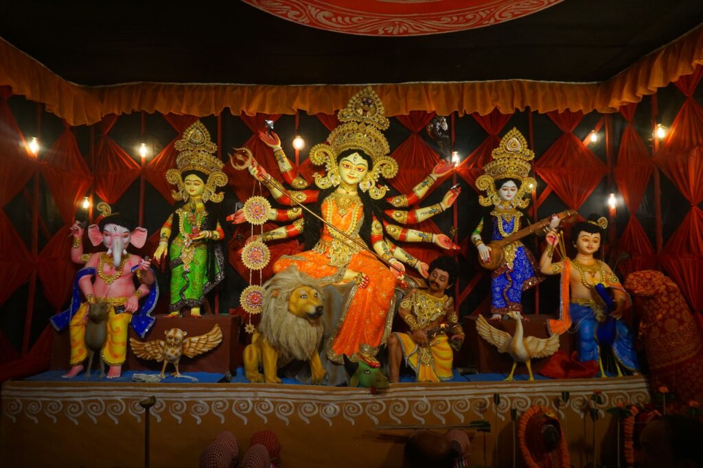Colorful statues of Hindu deities during Durga Puja festival in Chattogram, Bangladesh.