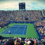 Thrilling tennis match at the US Open with a full stadium of enthusiastic fans.