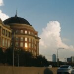 View of a historic dome building in Dallas, Texas, featuring urban architecture.
