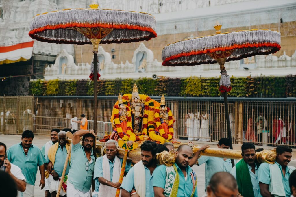 Capturing a vibrant Hindu procession at Tirumala Temple, highlighting cultural and religious traditions in Tirupati, India.