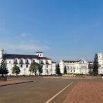Beautiful view of Se Cathedral, a historic landmark in Old Goa, under a bright blue sky.