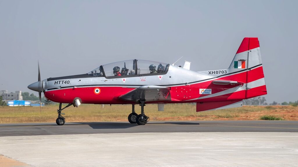 HAL HTT-40 aircraft on runway, Bengaluru, India, clear day.