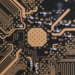 Detailed image of a printed circuit board highlighting electronic pathways and components.