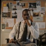 Focused detective in a modern office setting, analyzing a crime board. Cinematic and intense mood.