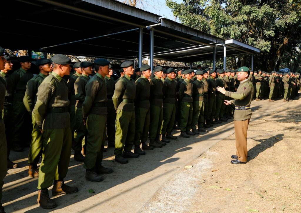 Gurkha soldiers in uniform during a training session in Pokhara, Nepal. Commanding officer addressing the troops.