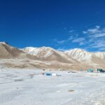Panoramic view of snowy mountains at Khunjerab Pass on the China-Pakistan border.