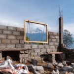 A construction site in Dhampus, Nepal, frames stunning view of Machhapuchhre peak.