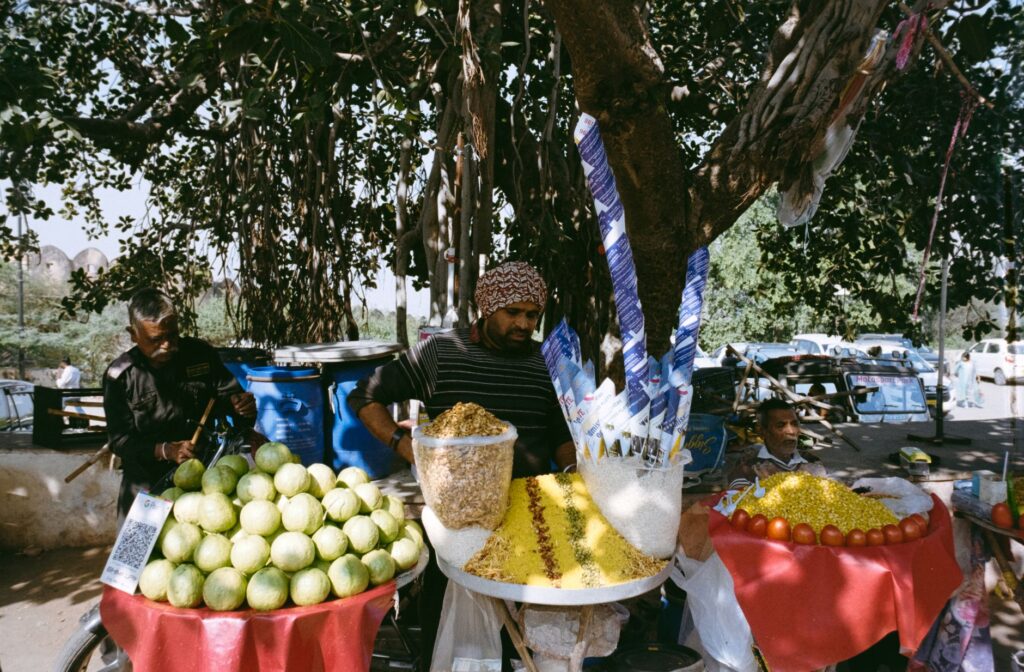 Vibrant street food market in Jaipur showcasing local vendors and fresh produce.