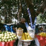 Vibrant street food market in Jaipur showcasing local vendors and fresh produce.