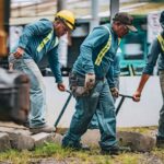 Team of construction workers collaborating on a project in San José, Costa Rica.