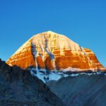 Stunning view of Mount Kailash illuminated by the sunrise, a majestic natural wonder.