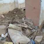 Interior of a building in Mocoa, Colombia, showing debris after a natural disaster.