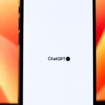 Close-up of a smartphone displaying ChatGPT with vibrant background. Ideal for tech and AI themes.