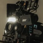 Detailed view of a high-end cinema camera rig with cine lens on a movie set in Istanbul, Türkiye.