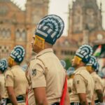 Indian police officers participate in ceremonial parade at Chhatrapati Shivaji Terminus, Mumbai.