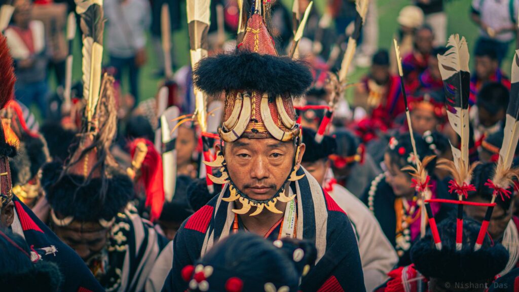 Vibrant capture of people in traditional tribal attire, showcasing cultural heritage.