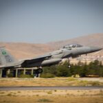 F-15 military jet taking off from Konya runway with Saudi Arabian markings.
