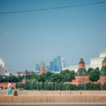 A scenic view of the iconic Kremlin towers in Moscow, capturing the blend of historical and modern architecture.
