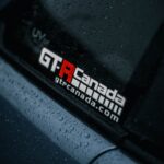 Close-up image showing raindrops on a car window with GTR Canada logo.