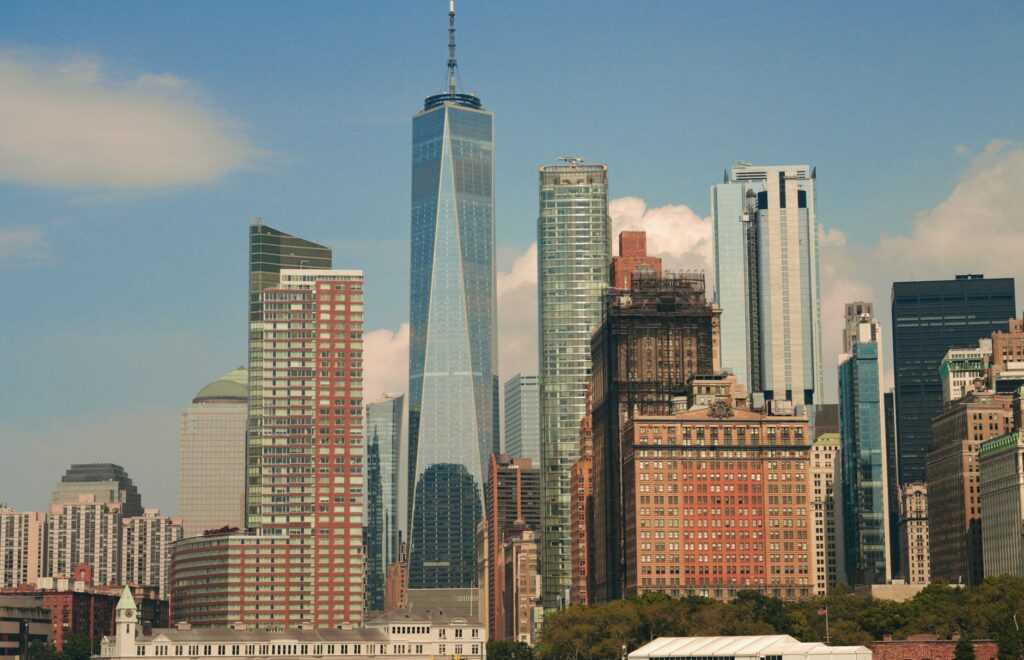 Impressive cityscape of New York City featuring the iconic One World Trade Center amidst modern skyscrapers.