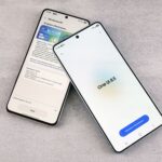 Two smartphones are shown displaying a software update screen with One UI 8.5.