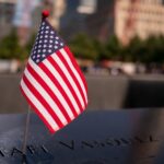 Close-up of a small American flag at the 9/11 Memorial in New York City.