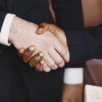 Close-up of a professional handshake symbolizing partnership and agreement.