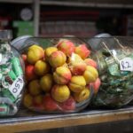 Vivid jars filled with assorted sweets and candies in a vintage setting, perfect for nostalgic themes.