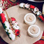Close-up of traditional Indian floral and decorative arrangements for a wedding ceremony.