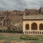Scenic view of Golconda Fort's architecture in Hyderabad, India on an overcast day.