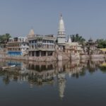 Picturesque landscape of Govardhan reflecting in water, Uttar Pradesh, India.