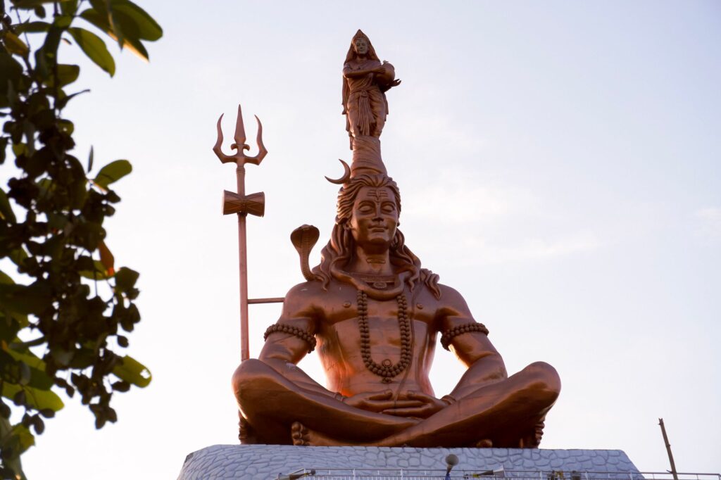 A striking statue of Lord Shiva under the open sky in Hajipur, India.