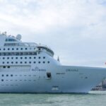 Luxurious cruise ship Oriana sailing through the waters, showcasing elegance and travel.