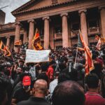 Massive political rally with protesters in Colombo, Sri Lanka, demanding change.