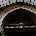 Elegant entrance of Türkiye İş Bankası with architectural details in Istanbul.