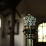 Close-up of a decorative crown detail inside a historic church in Holmes Chapel, England.