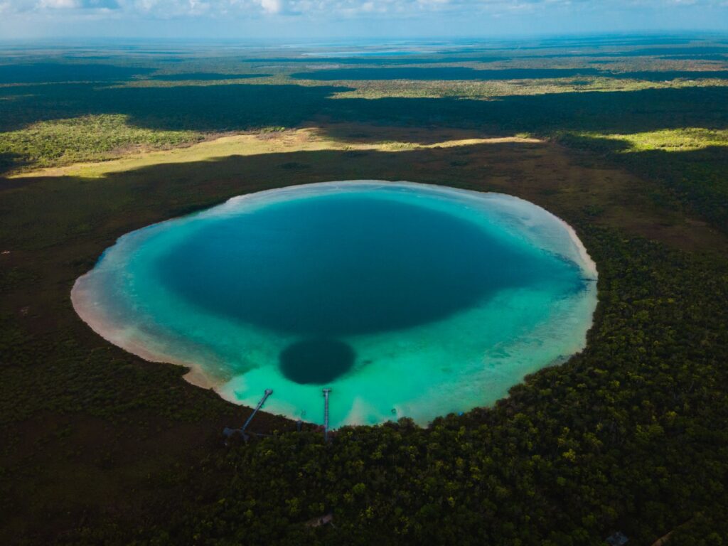 Breathtaking aerial view of Laguna de Kaan Luum near Tulum, showcasing vivid colors and natural beauty.
