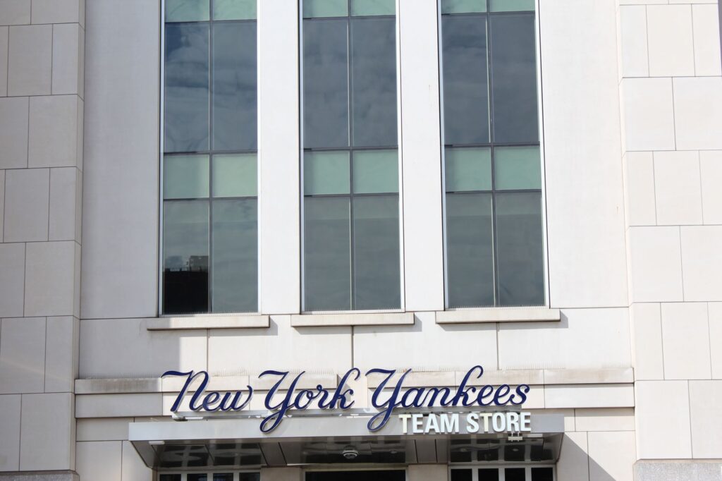 Close-up of the New York Yankees Team Store facade, featuring modern architecture.